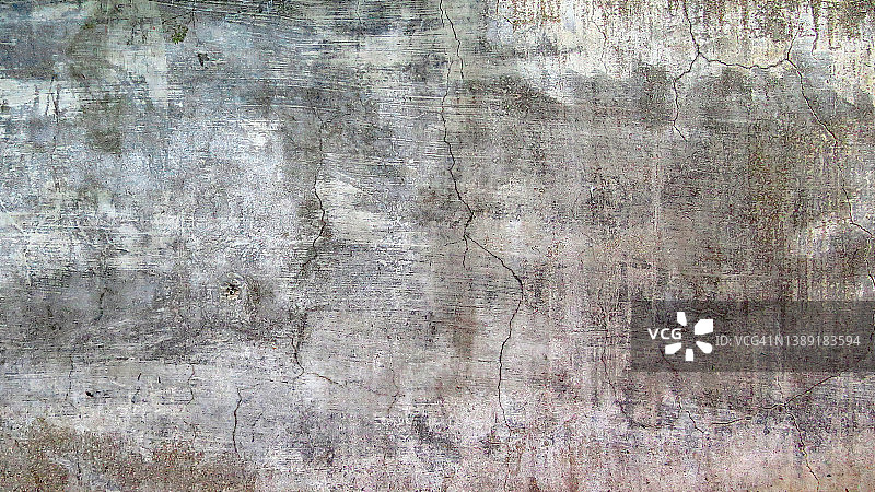 巴黎带有风化油漆的空裂混凝土墙特写图片素材