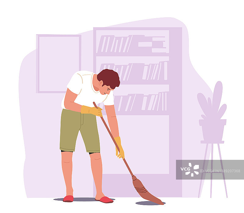 居家日常：客厅家务。年轻男人用扫帚打扫地面图片素材