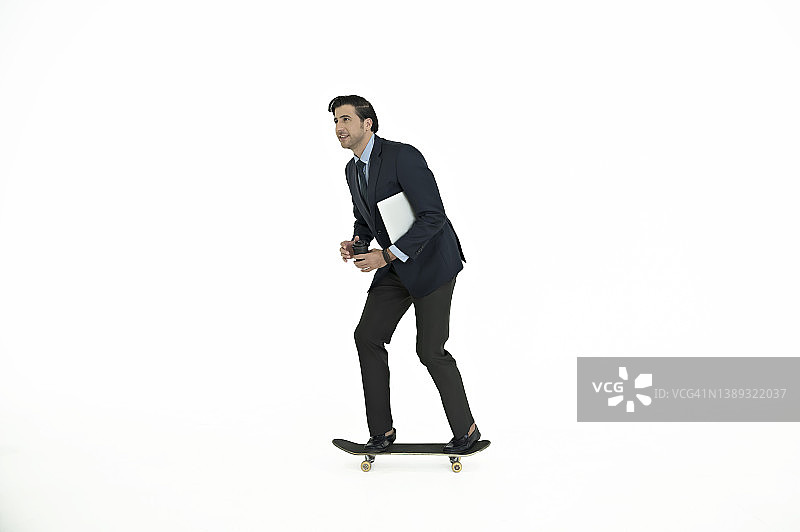 商人滑冰去上班图片素材