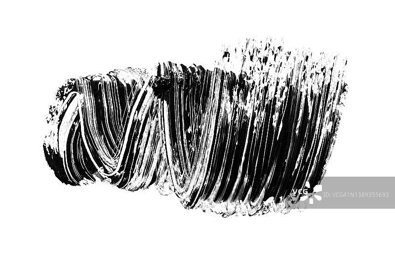 白色背景上的黑色睫毛膏污迹，化妆睫毛美容产品图片素材