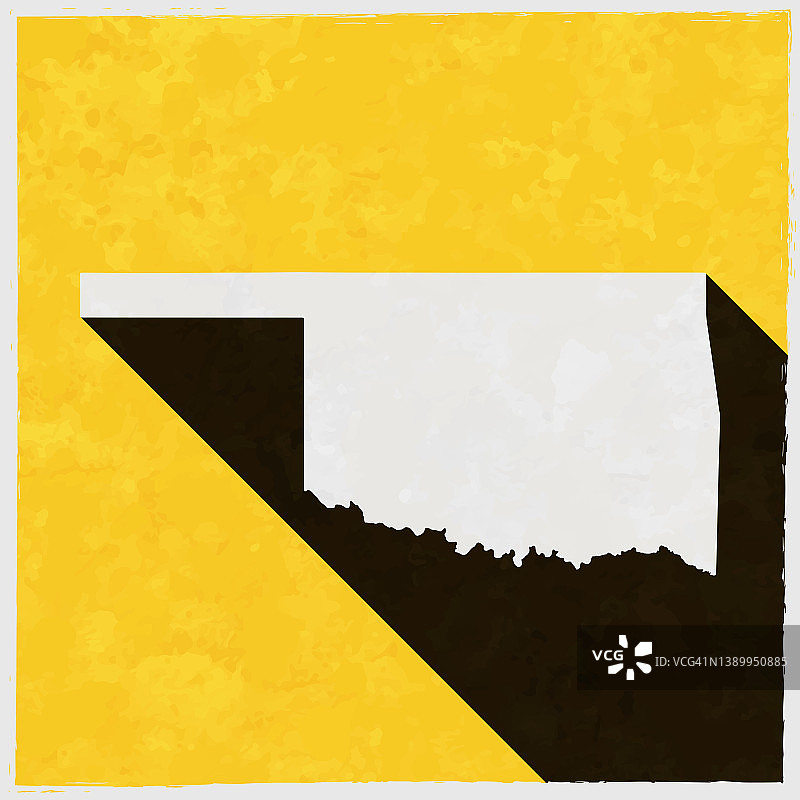 在黄色纹理背景上带有长阴影的俄克拉何马州地图图片素材