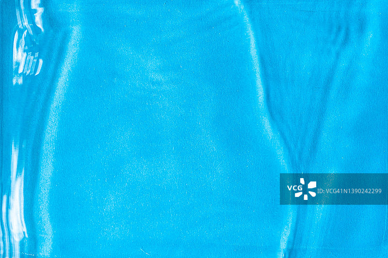 蓝色背景下的水纹理图片素材