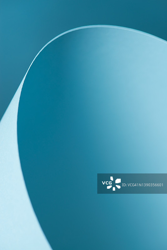 具有圆形图案的抽象蓝绿色背景特写图片素材