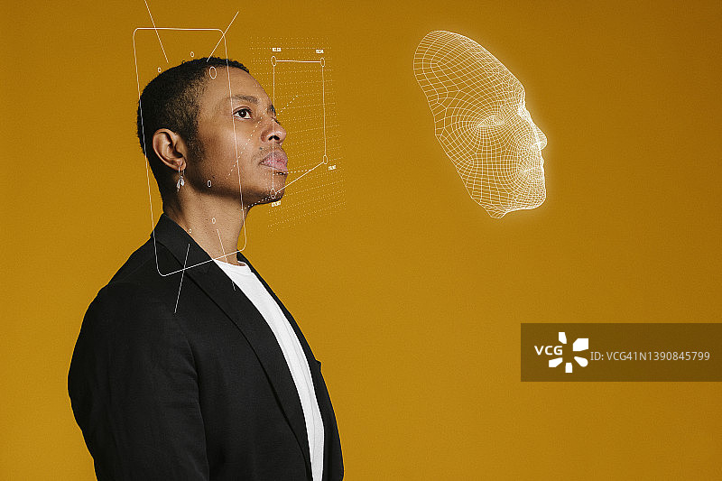 年轻男人的3D面部建模图片素材