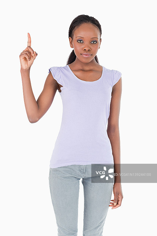 指向白色的女人特写图片素材