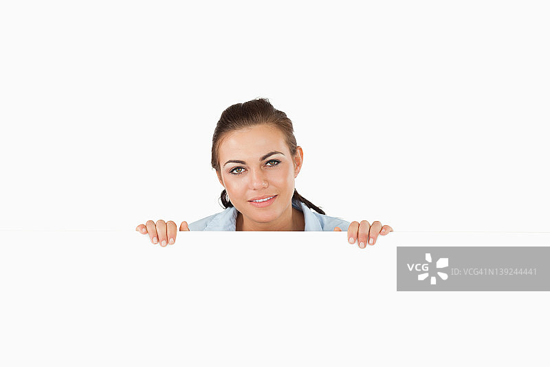 正在看墙的女商人图片素材