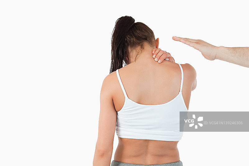 背影：女性颈部疼痛图片素材