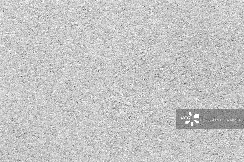 白色环保再生牛皮纸，薄板纹理纸板背景。图片素材