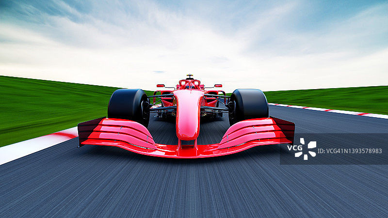 在赛道上行驶的红色赛车图片素材
