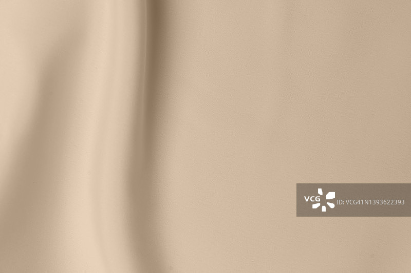 纹理，棕色背景，图案。质地为棕色真丝织物。漂亮的棕色柔软的真丝面料。图片素材