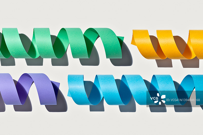 盘绕纸条连接概念图片素材