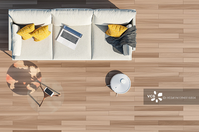 现代客厅中的机器人真空吸尘器，配有沙发、电脑桌面和电话，3D渲染图片素材