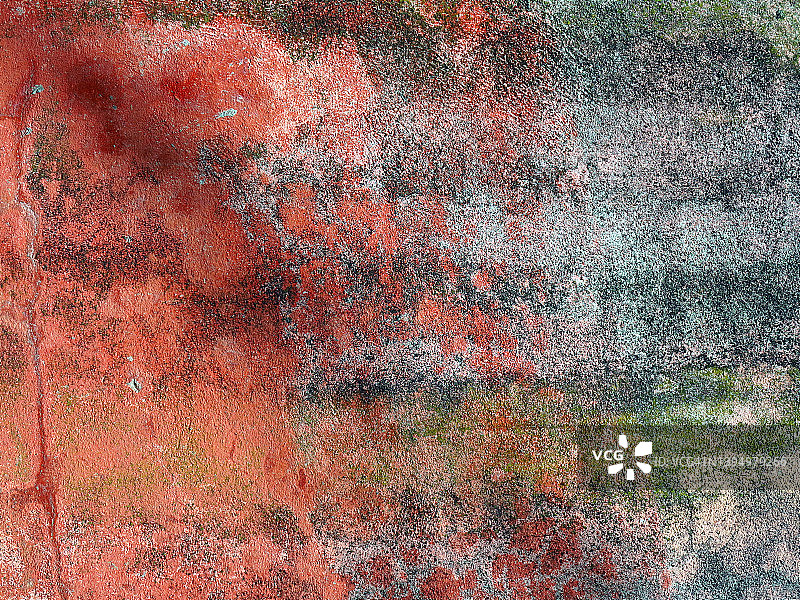 马德拉岛尘土飞扬的墙上风化的红色油漆图片素材