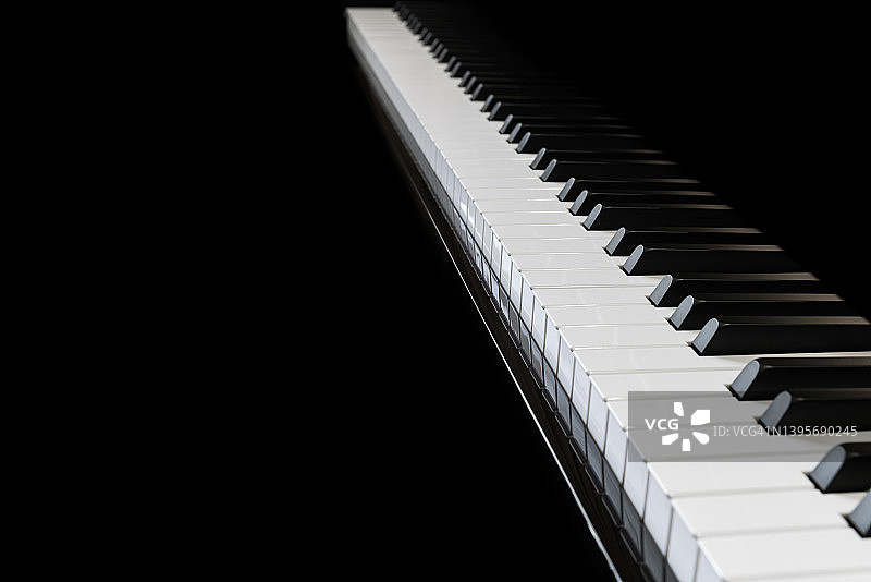 黑色背景上的钢琴和钢琴键盘图片素材