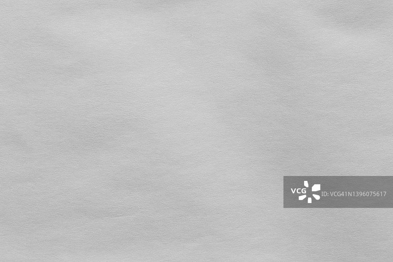 白色环保再生牛皮纸，薄板纹理纸板背景。图片素材