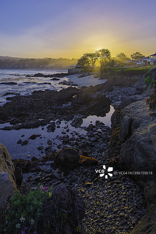 卡梅尔海滩日出图片素材