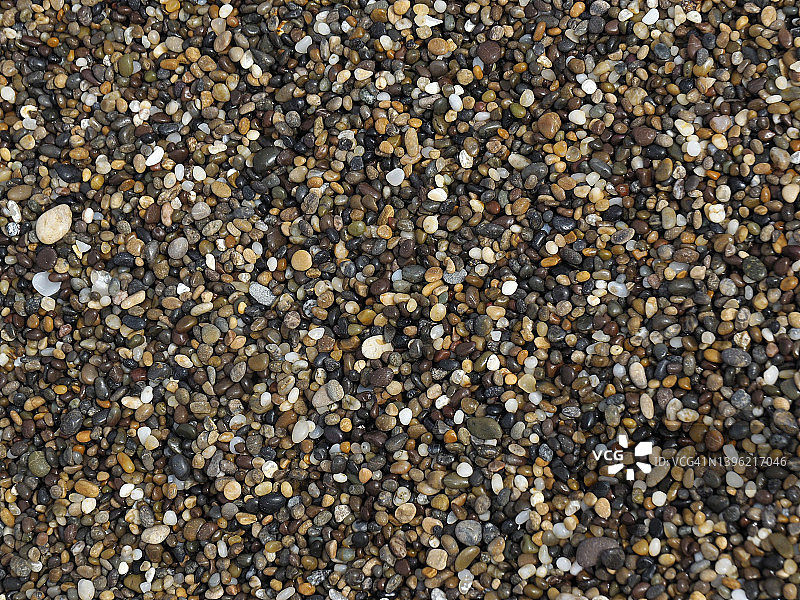加利福尼亚州豆穴州立海滩彩色鹅卵石图片素材