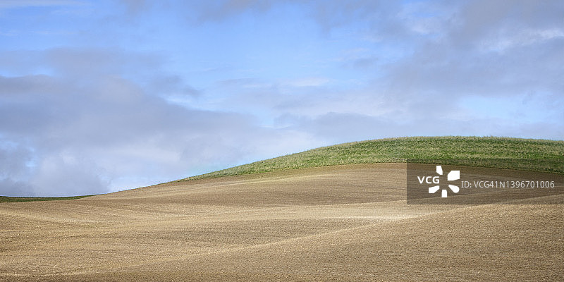 华盛顿州帕卢斯郡美丽的农田和丘陵图片素材