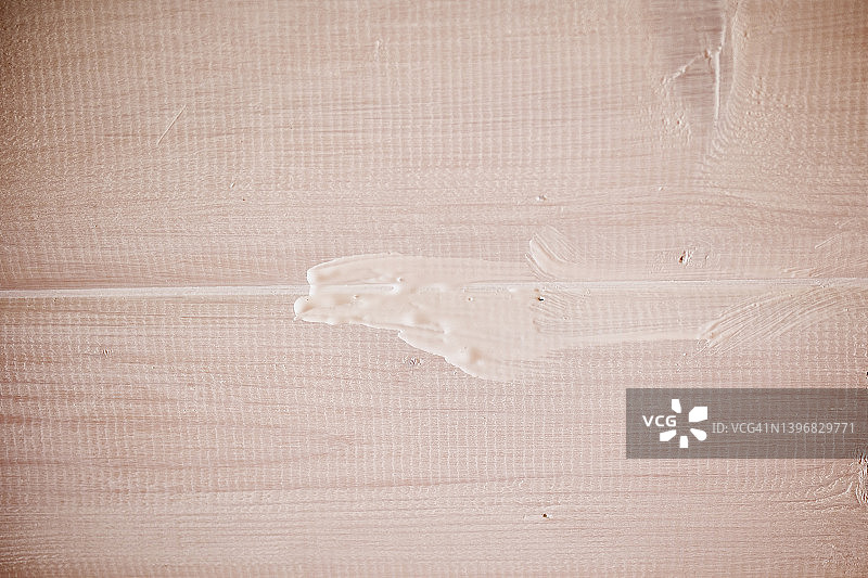 木质背景上的油漆涂抹痕迹图片素材