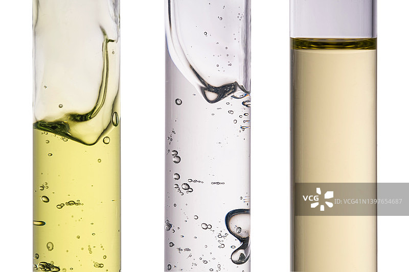 含有绿色凝胶、透明化妆品凝胶和油的三个试管图片素材