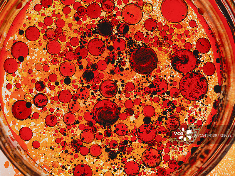 橙色和红色圆形油滴图片素材