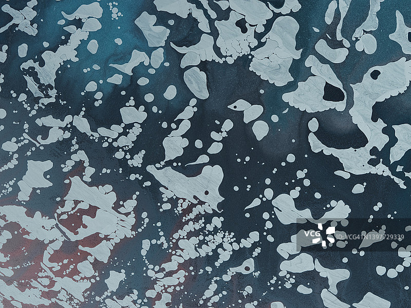 蓝色背景上的白色油渍图案图片素材