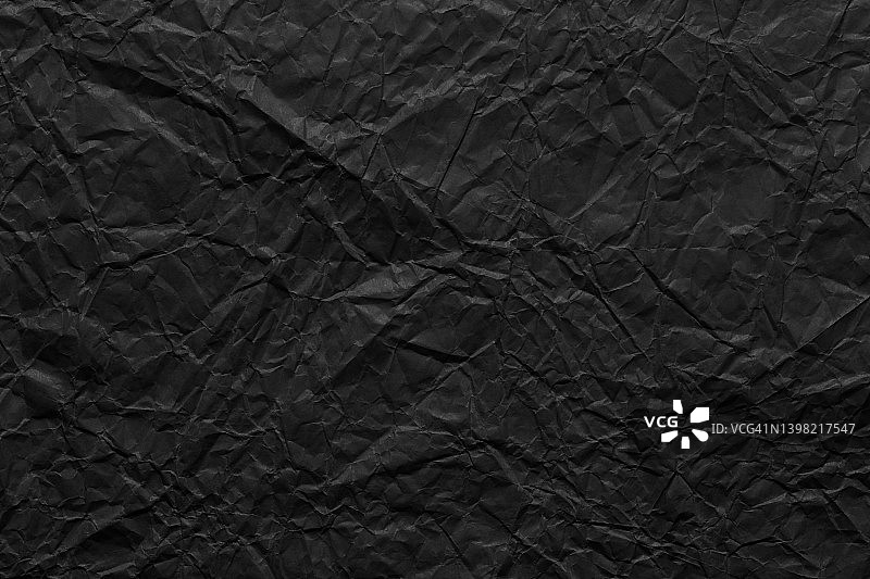 黑色褶皱纸纹理背景图片素材