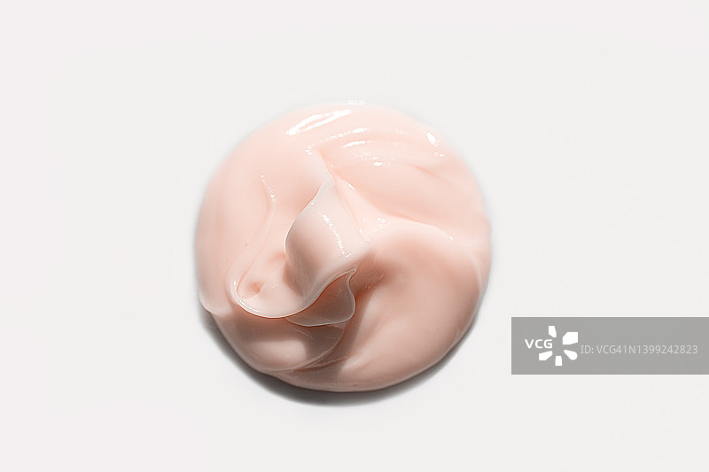 美容化妆品产品质地：粉色染发膜或面霜，护手霜图片素材