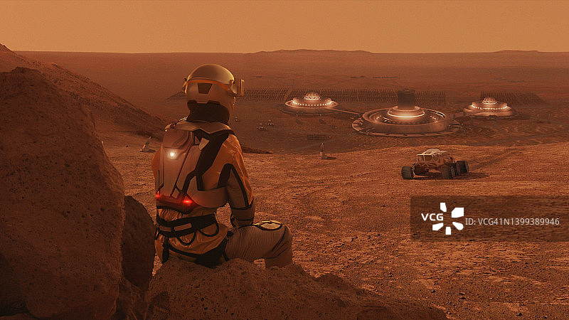 宇航员在火星上观看探测器。太空地球殖民图片素材