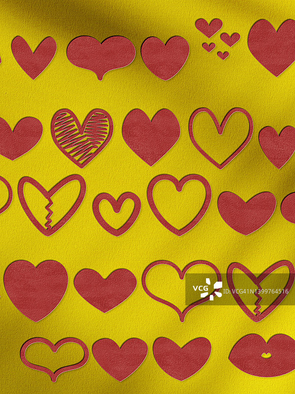 不同风格的红色涂鸦纸质爱心，黄色背景图片素材