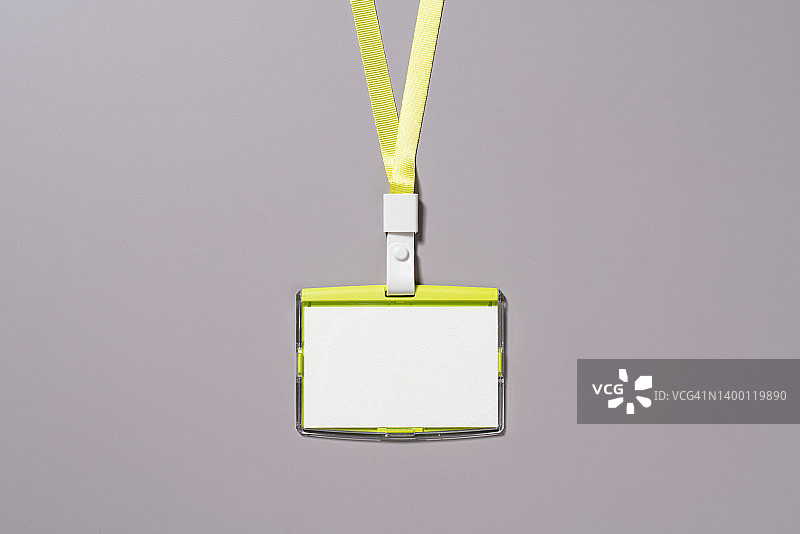 绿色挂绳空白身份牌特写图片素材