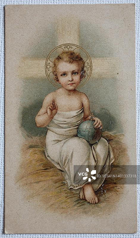 圣像画：耶稣圣婴手持十字架地球仪，德国，1910年，十九世纪原版数字修复再现，确切日期未知图片素材