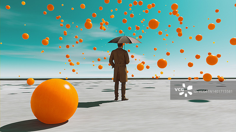 橙色球从天空落下，男子打伞观看图片素材