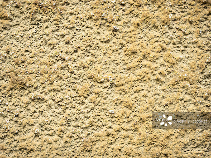 类似小石头的纹理黄色墙面图片素材