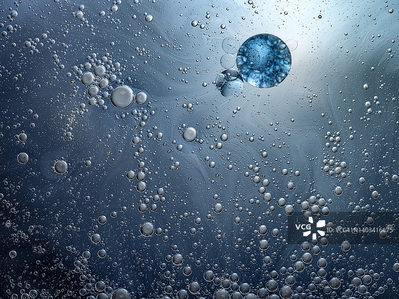 蓝色液体的气泡和水滴图片素材