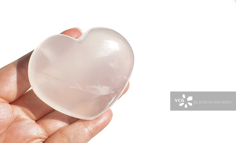 手持心形向日葵石英晶体图片素材