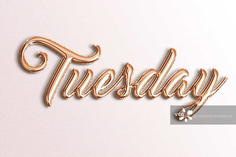 金色玫瑰箔气球拼写的“星期二”字样图片素材