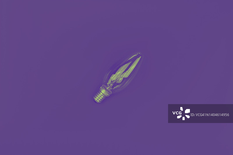 紫色背景上的灯泡图片素材