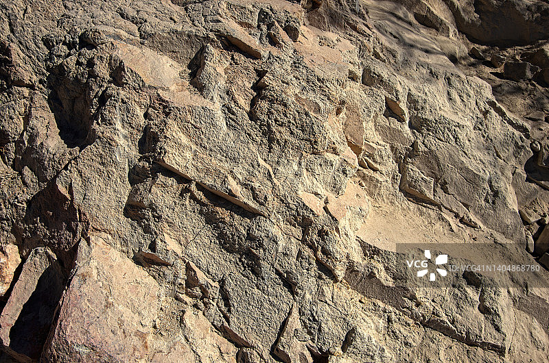 墨西哥贝纳尔岩城的斑状浅色火成岩石面图片素材