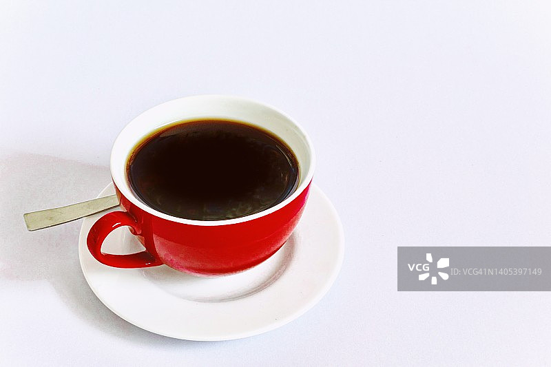 商人办公桌上的咖啡杯特写图片素材