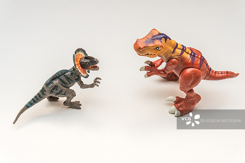 异特龙和双脊龙搏斗特写图片素材