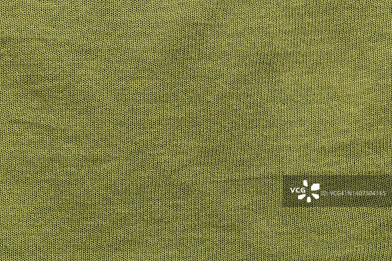 大部分为褪色的深黄色涤纶织物纹理和纺织背景图片素材