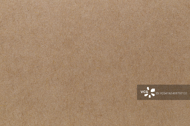 棕色纸张质地的纸板背景。图片素材