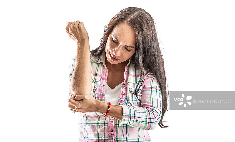 患有网球肘的年轻女人，肘部疼痛 - 隔离在白色背景上图片素材