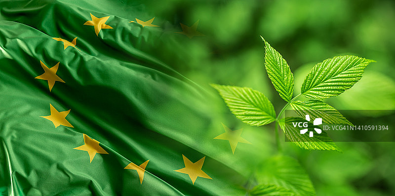 象征欧洲有机食品、生态或可再生资源的绿色欧盟旗帜图片素材