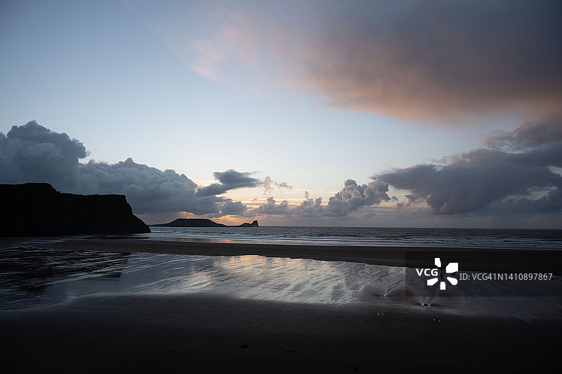 罗西里蠕虫岬海滩沉船日落倒影图片素材