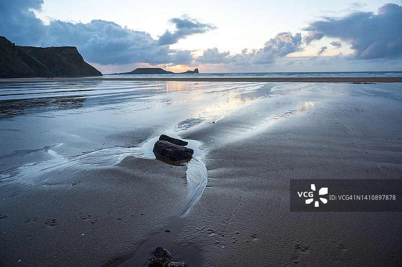 罗西里蠕虫岬海滩沉船日落倒影图片素材