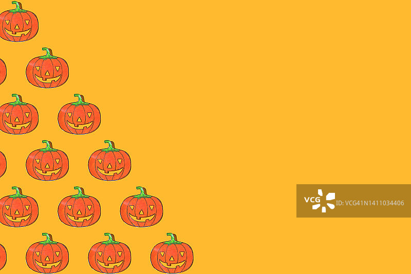 儿童绘制的万圣节南瓜灯重复图案，黄色背景万圣节庆祝概念图片素材