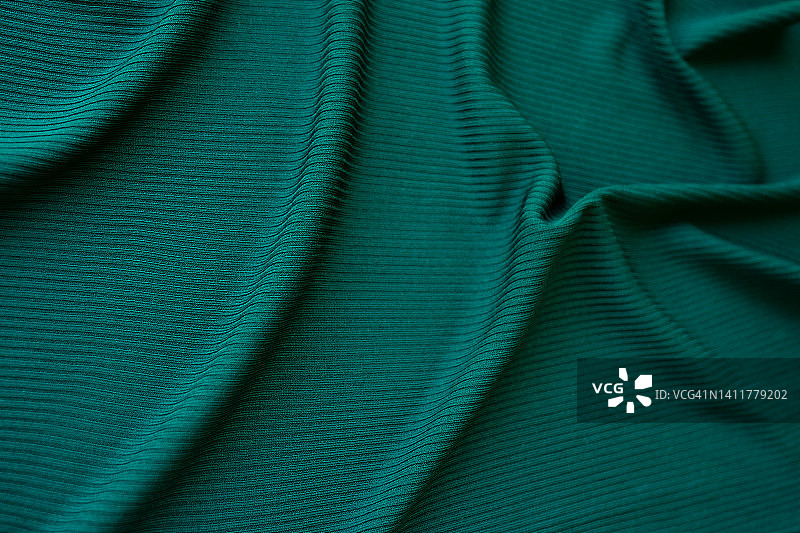 绿色织物纹理特写：纺织背景图片素材