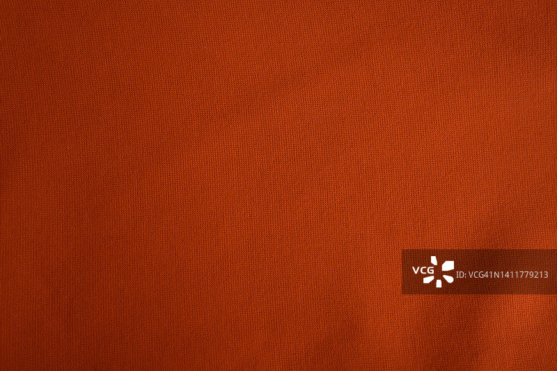 橙色织物纹理特写图片素材